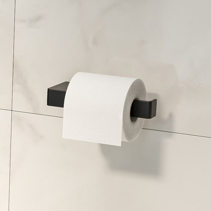 lifestyle image of origins living matt black pirinei open toilet roll holder
